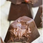 Easy Homemade Gourmet Chocolate (Fancy Chocolate) With Nutella Filling on Wood Background