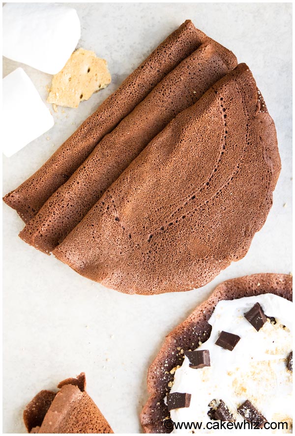 Overhead Shot of Folded Best Cocoa Crepes on White Background