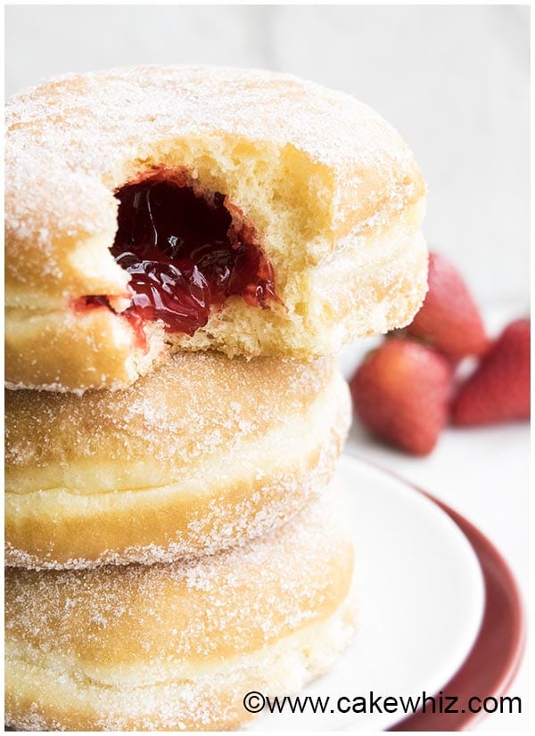 Easy Jewish Hanukkah Sufganiyot- Partially Eaten- Closeup Shot 