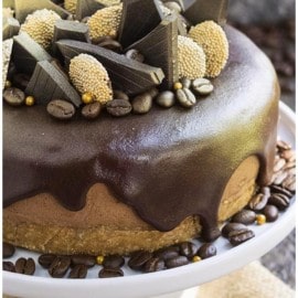 Easy No Bake Coffee Cheesecake With Ganache Topping and Chocolate Decorations.