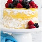 Moist Lemon Cake With Lemon Curd Filling on White Cake Stand