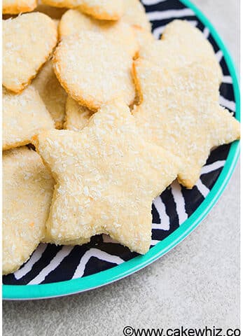 Easy Cut Out Coconut Sugar Cookies in Patterned Dish.