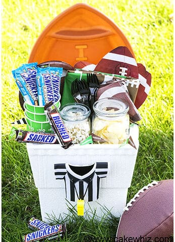 Homemade Football Gift Basket on Grass For Game Day.