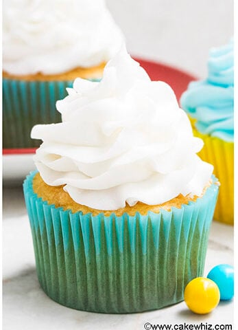Easy White Chocolate Buttercream Frosting Swirl on Top of Cupcakes.