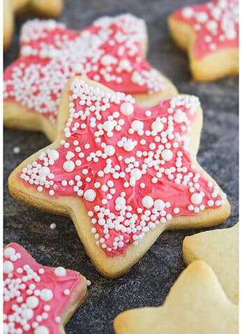 Easy Pink Champagne Cookies With Champagne Buttercream Frosting on Rustic Gray Background