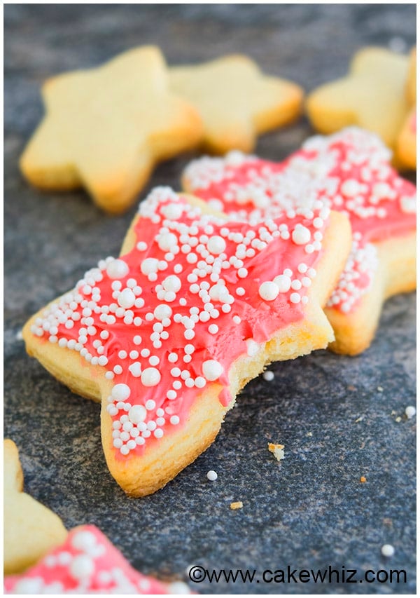 Partially Eaten Cut Out Star Cookie on Gray Background