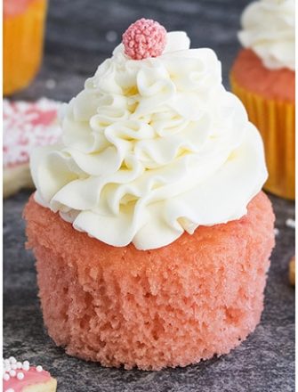 Easy Pink Champagne Cupcakes With Champagne Buttercream Frosting on Rustic Gray Background