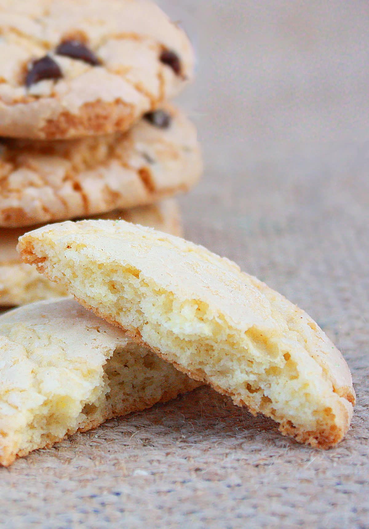 Cookie broken in half to show a closeup of the inside texture. 