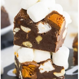 Stack of Easy Rocky Road Fudge on Black Tray.