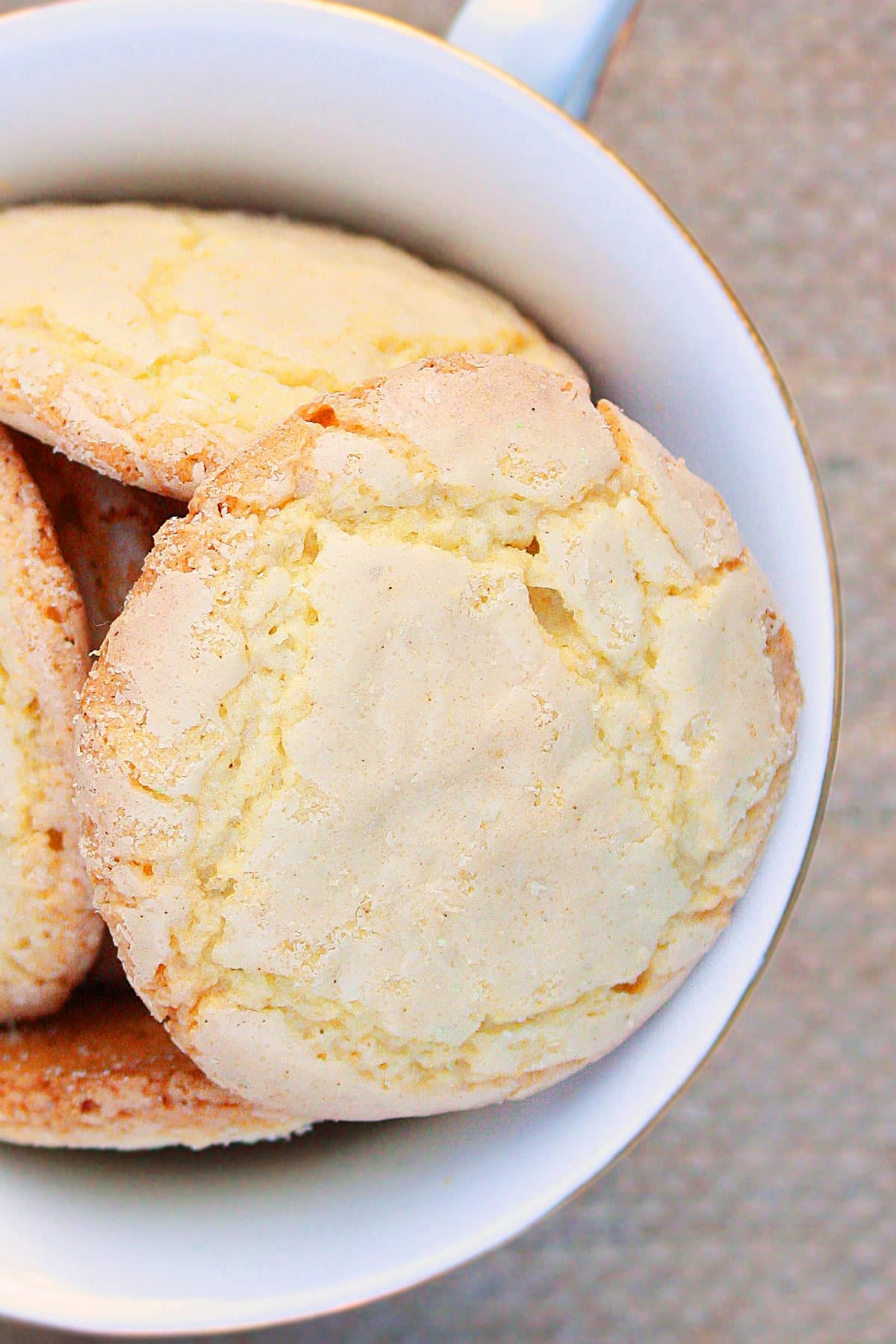 Easy vanilla crackle cookies in white bowl- Overhead Shot. 