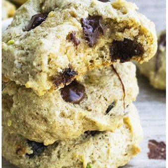 Stack of Easy Avocado Cookies With Chocolate Chips With One Partially Eaten.
