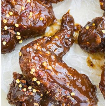 Easy Spicy Honey BBQ Wings on Sheet of Wax Paper.
