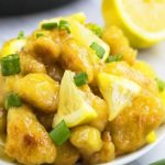 Best Easy Chinese Lemon Chicken on White Dish With Marble Background.