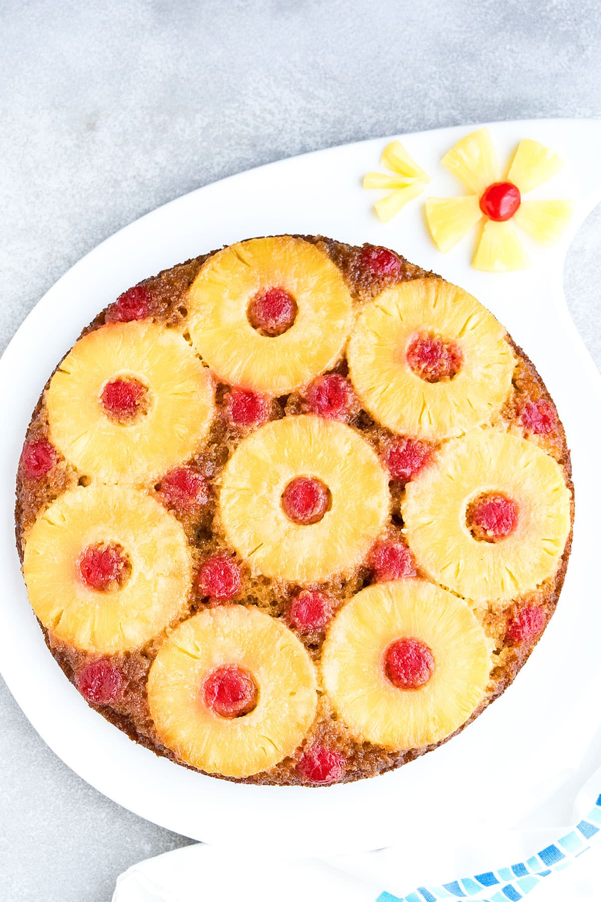 Best Pineapple Upside Down Cake on White Dish.
