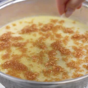 Melted butter and brown sugar in a round pan. 