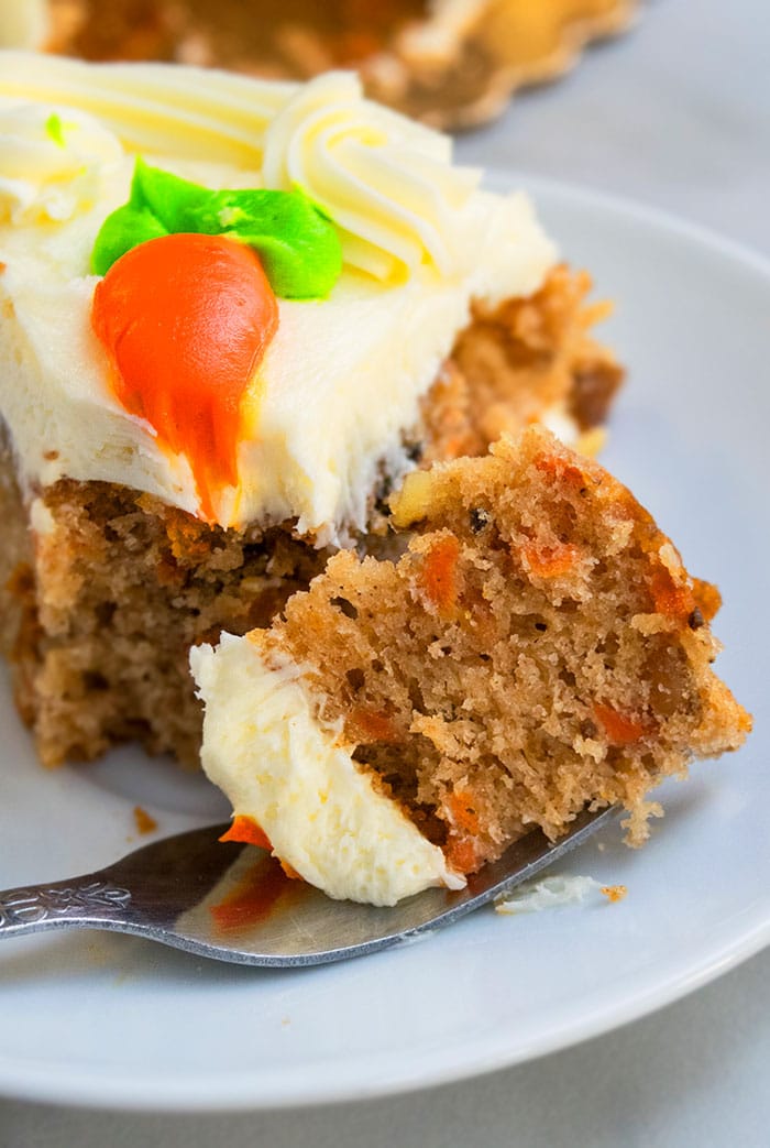 Fork Full of Moist Cake on White Plate