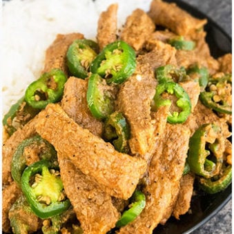 Easy Chinese Jalapeno Beef on Black Dish.