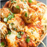 Easy Cheesy Meatball Parmesan in Rustic Dish.
