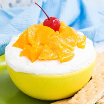 Easy Peaches and Cream Dip in Yellow Bowl.