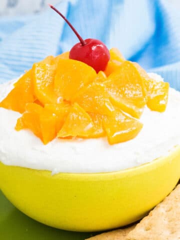 Easy Peaches and Cream Dip in Yellow Bowl.