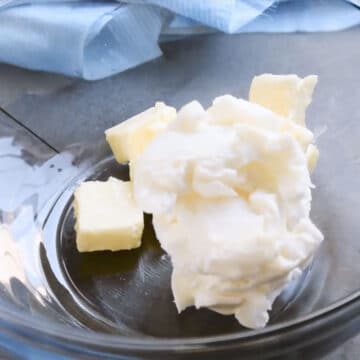 Butter and shortening in glass bowl. 