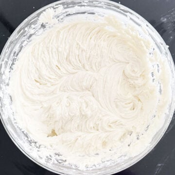 Whipped heritage frosting in glass bowl. 