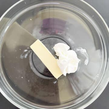 Butter and shortening in glass bowl. 