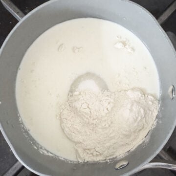 Flour, sugar and milk in nonstick saucepan. 