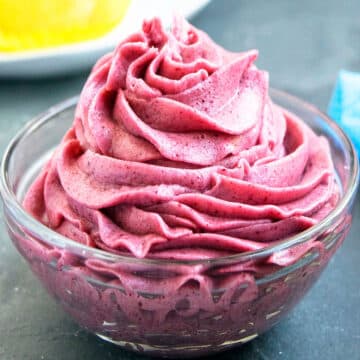 Best Easy Fresh Blackberry Buttercream Frosting in Glass Bowl.