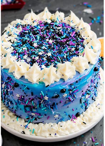 Best Easy Galaxy Cake Decorated With Buttercream Icing on White Dish.