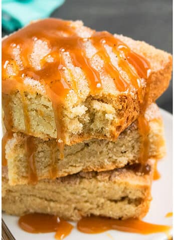 Easy Snickerdoodle Bars With Caramel Sauce on White Plate
