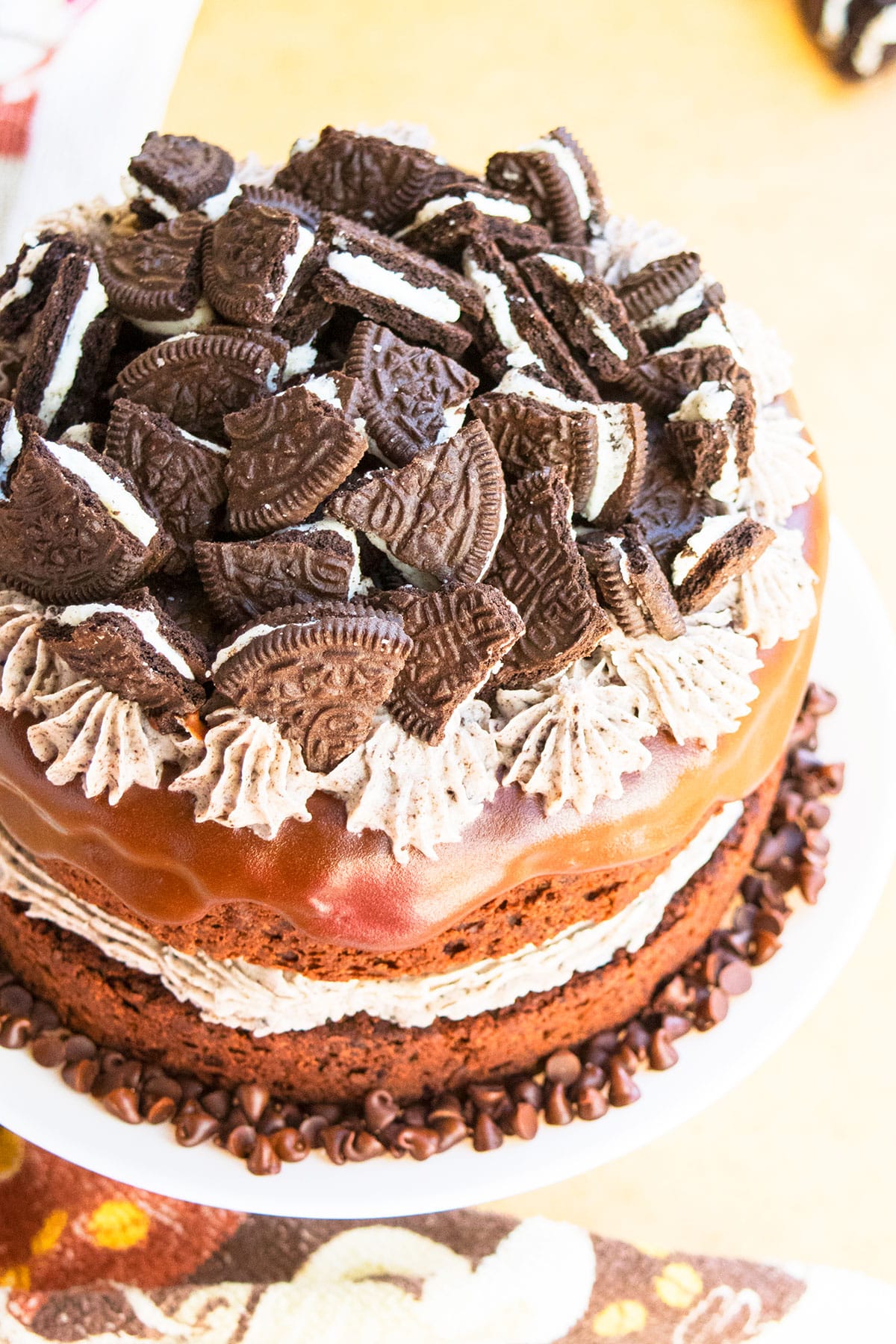 Cookies and cream layer cake on white cake stand- Closeup shot.