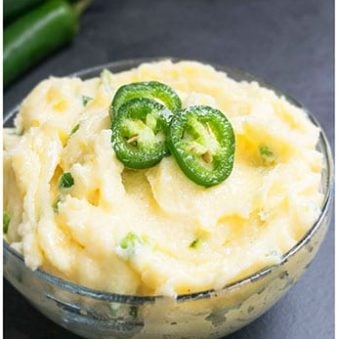Best Easy Garlic Mashed Potatoes With Jalapenos in Glass Bowl.