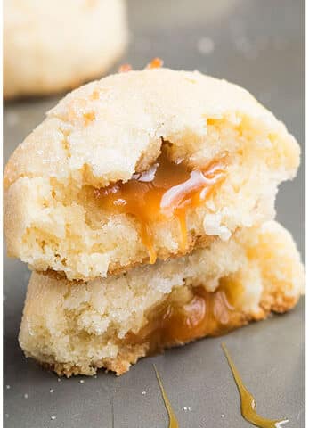 Stuffed Caramel Coconut Cookie Cut in Half and Stacked on Top of One Another.