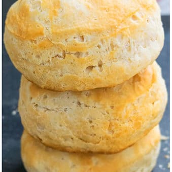 Stack of Best Easy Homemade Buttermilk Biscuits on Dark Gray Background.