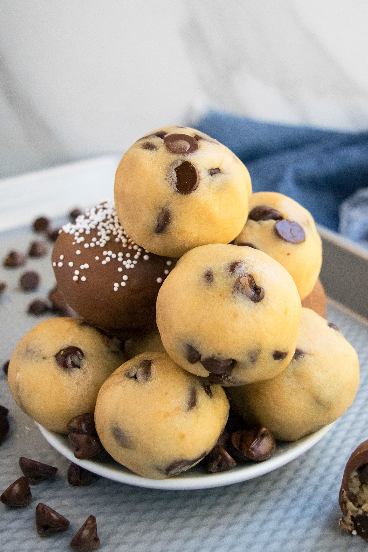 Easy Eggless Chocolate Chip Cookie Dough Truffles on White Dish.