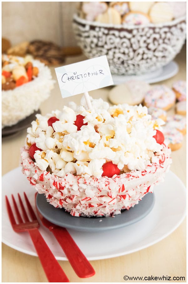 Edible Cookie Cups Filled With Popcorn and Red Candies on White and Gray Dish