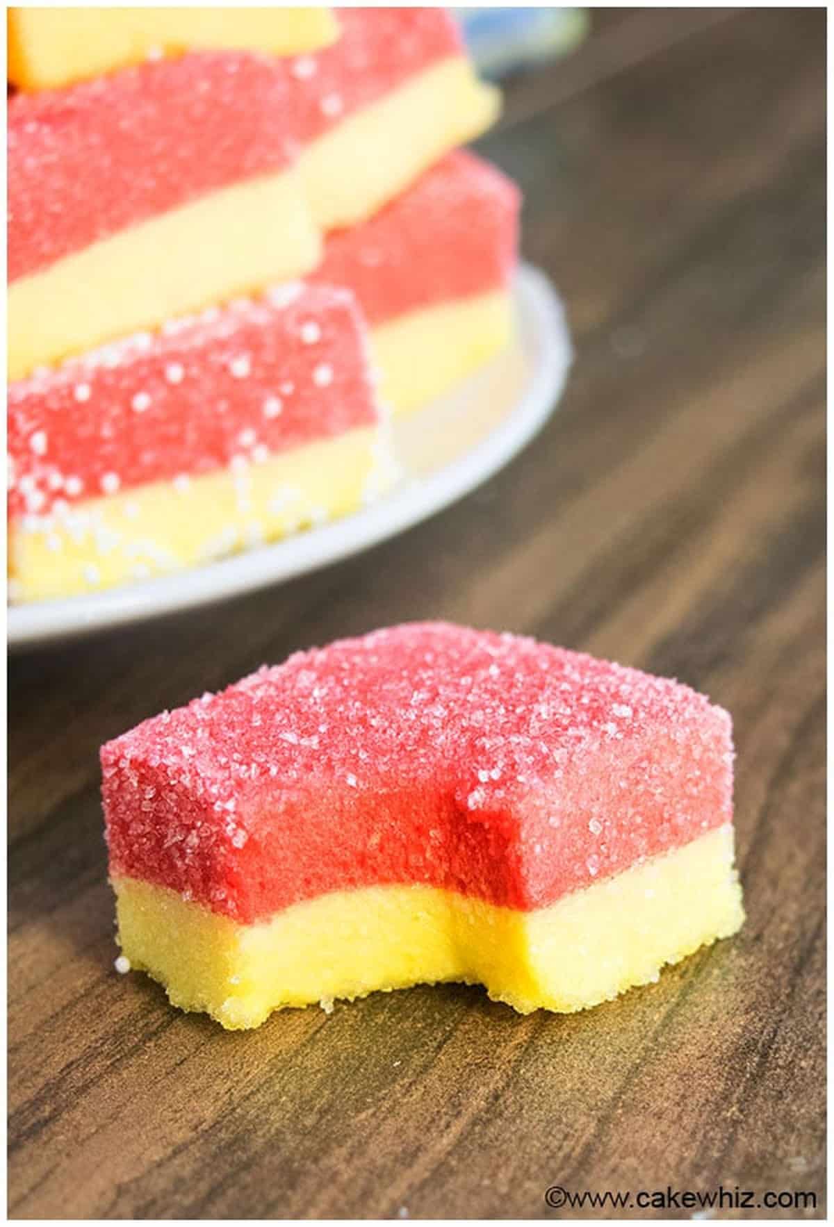 Partially eaten candy on wood background. 