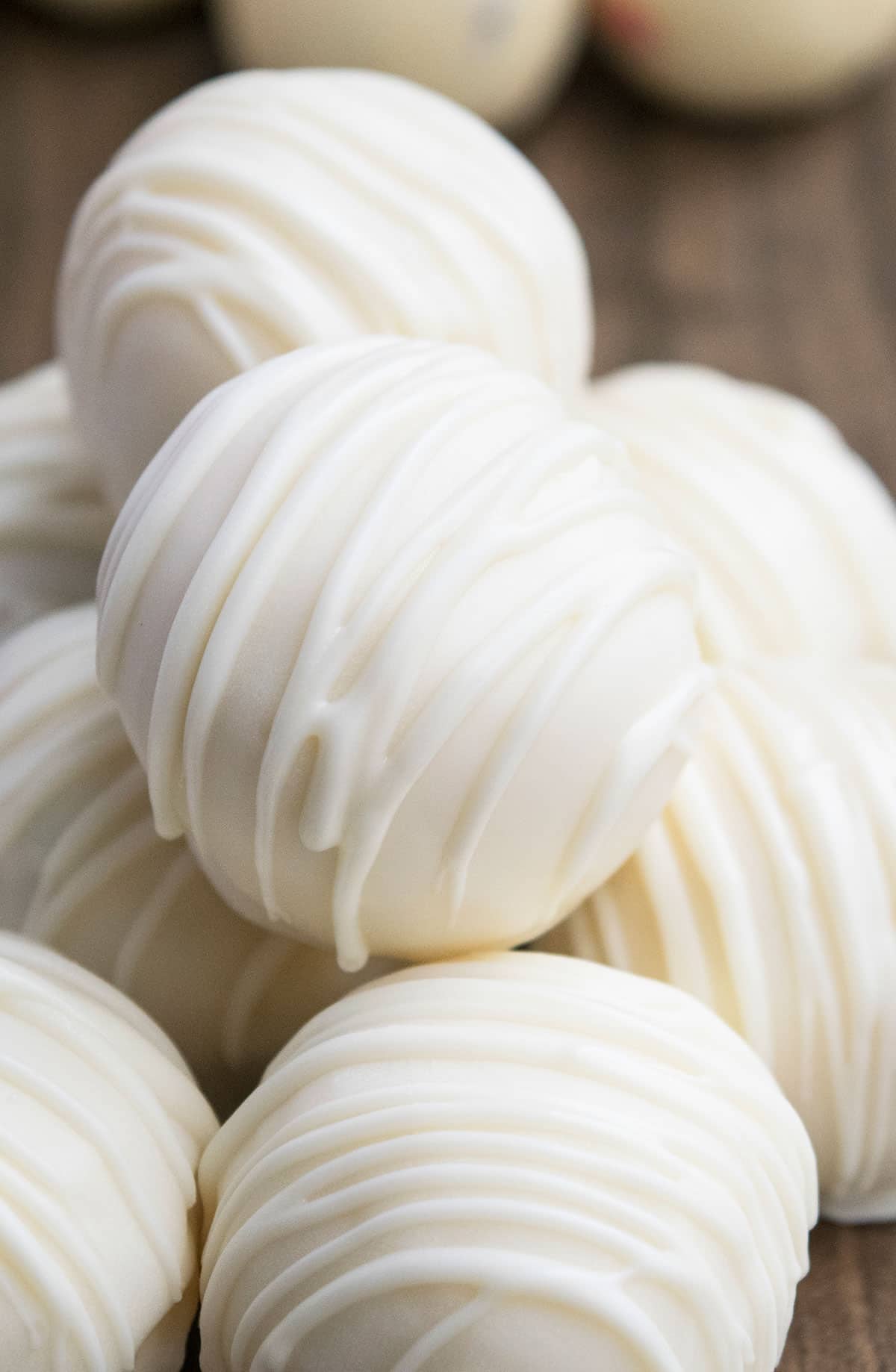 Easy Homemade White Chocolate Truffles on Wood Background. 