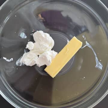 Butter and shortening in glass bowl. 