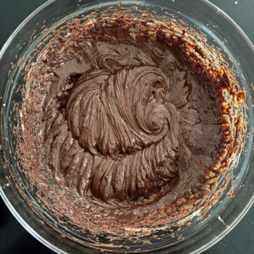 Glass bowl with chocolate mixture. 