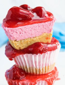 Mini No Bake Strawberry Cheesecake Cupcakes Stacked on White Dish