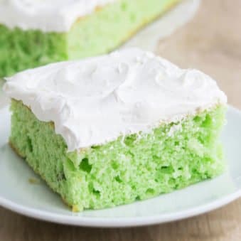 Pistachio Cake with Cake Mix and Whipped Cream on White Dish.