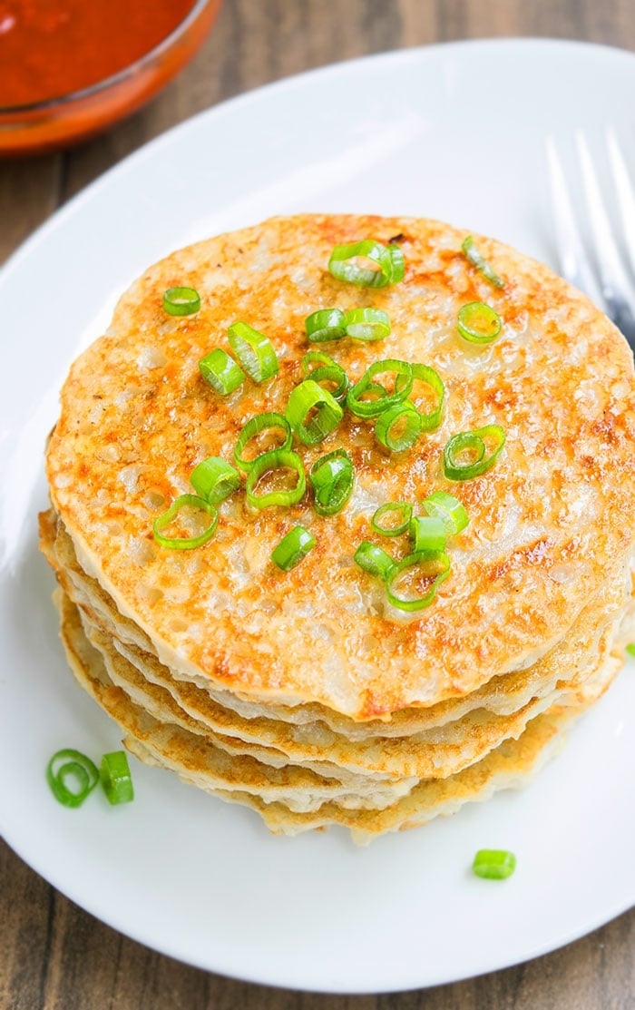 Stack of Mashed Potato Pancakes on White Dish. 