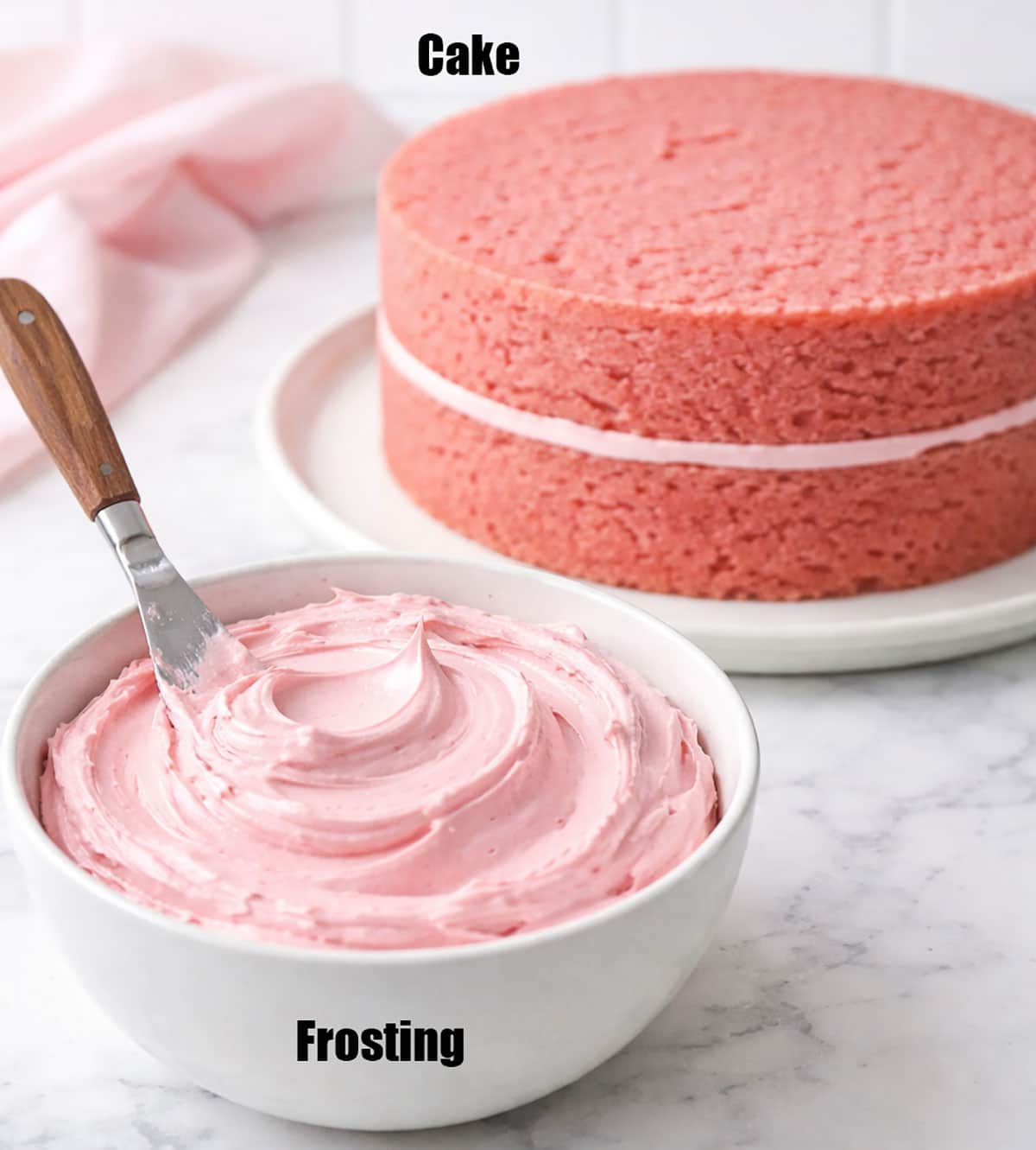 Ingredients for cake on white marble background.