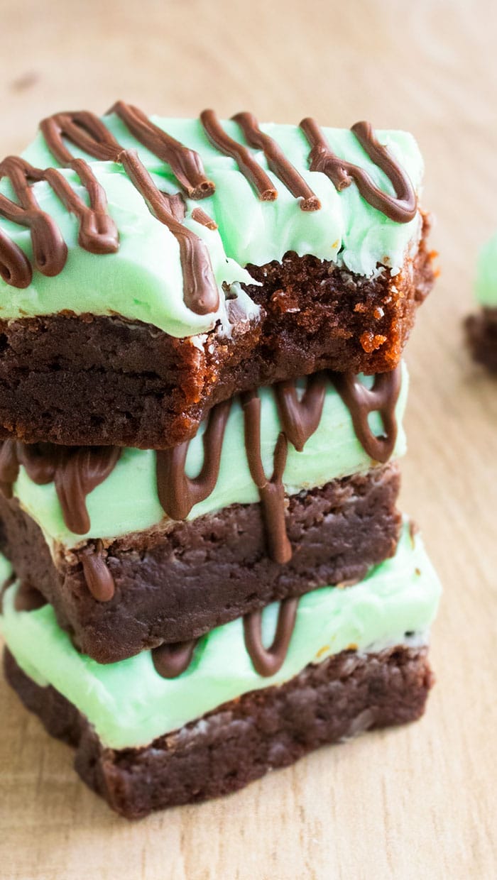 Stack of Chocolate Mint Brownies on Wood Background. 