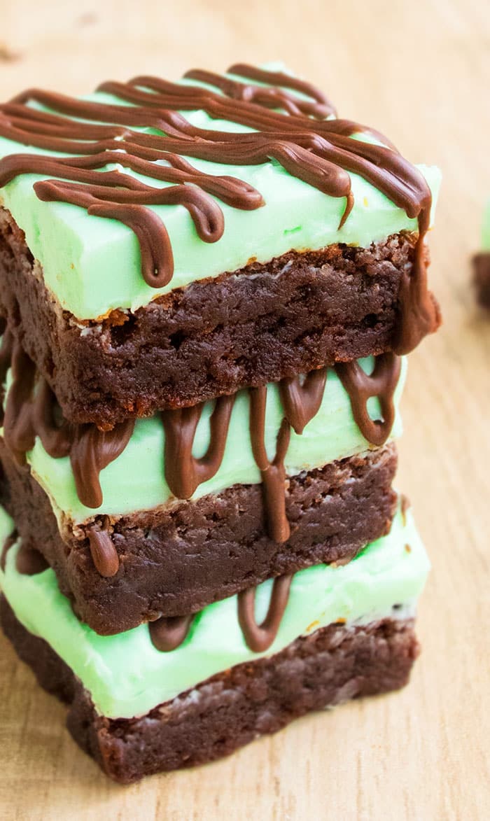 Stack of Mint Brownies on Wood Background. 