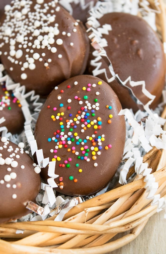 Easy Homemade Peanut Butter Eggs With Sprinkles in Fake Nest. 