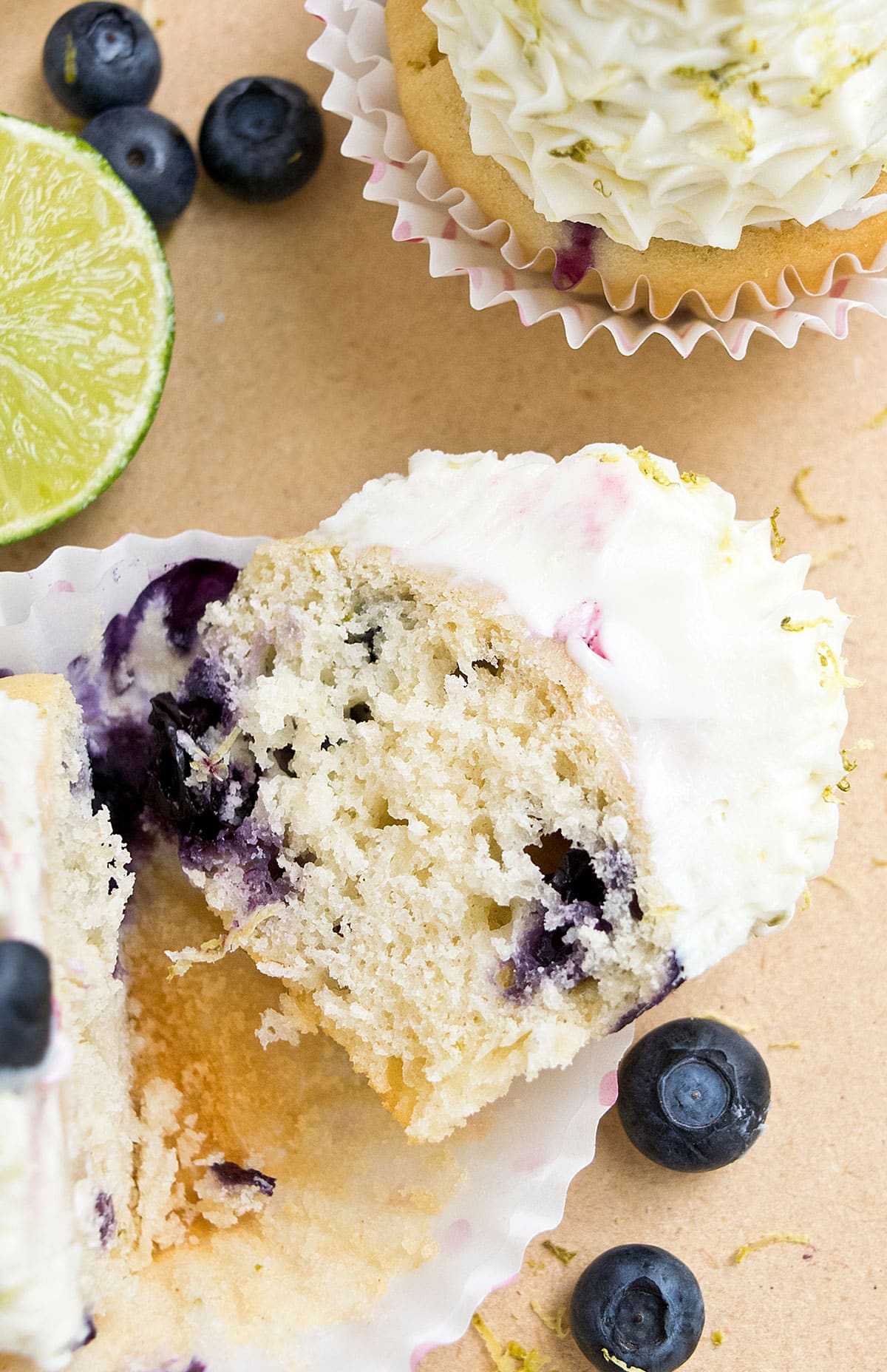 Cupcake sliced in half to show a closeup shot of the inside.