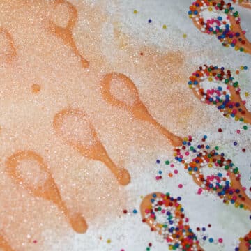 Chocolate loops covered in sprinkles and colored sugar. 